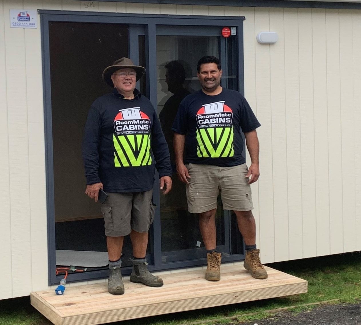 Auckland men wearing rental room mate cabin tshirt
